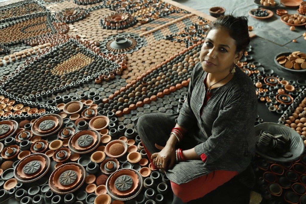 Marufa A. Chowdhury with Santal Gaon Installation